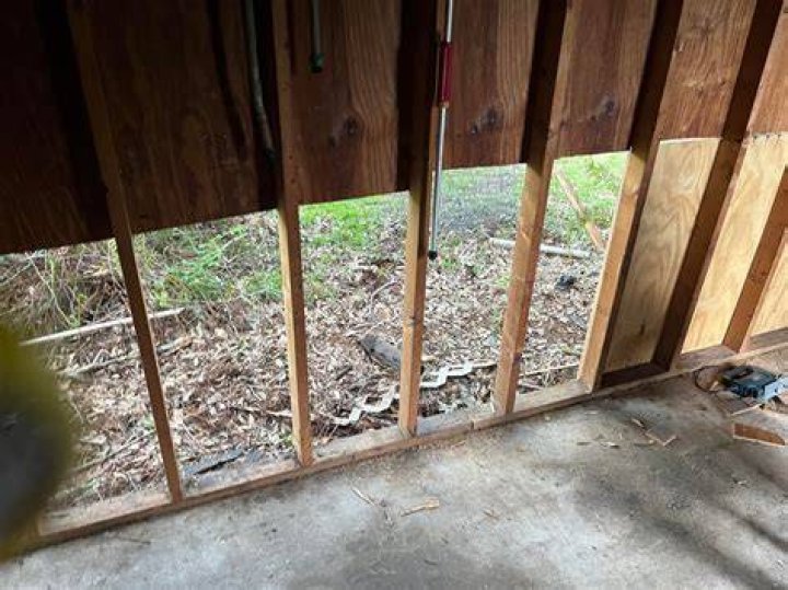 How do I fill the gaps in my wood shed?