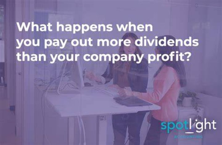 When a company pays dividends What happens?